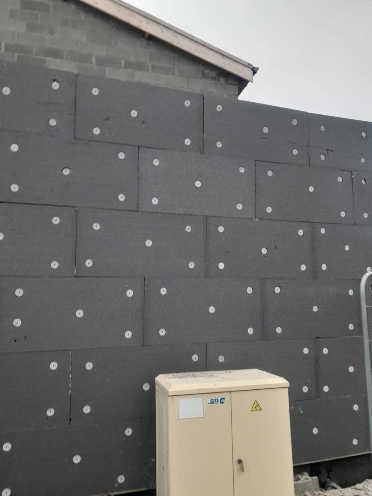 Isolation thermique par l'extérieur – Pendant — isolation du mur pignon